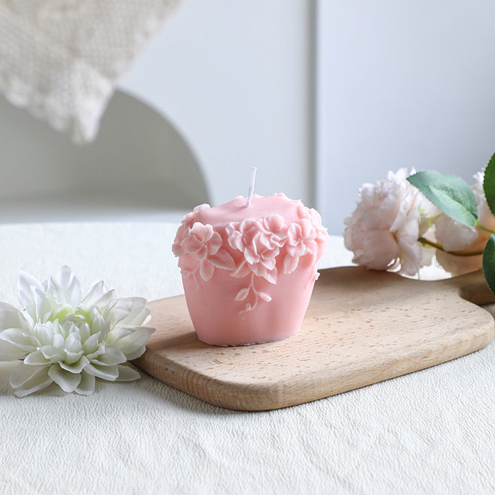 Rose-colored scented candle made from soy wax, handcrafted