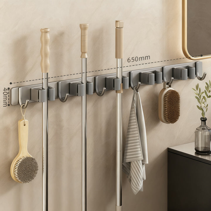 Wall bracket for brooms and mops made of stainless steel