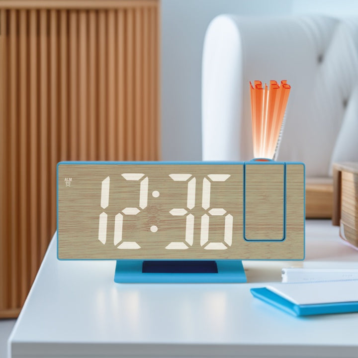 LED projection clock with light sensor
