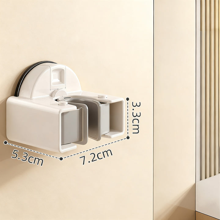 Suction cup holder for brooms and mops