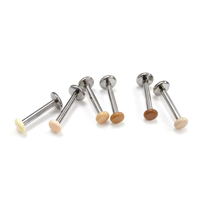 Titanium alloy earrings with zirconia, screw closure