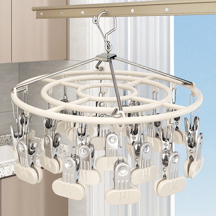 Clothes drying rack with clips