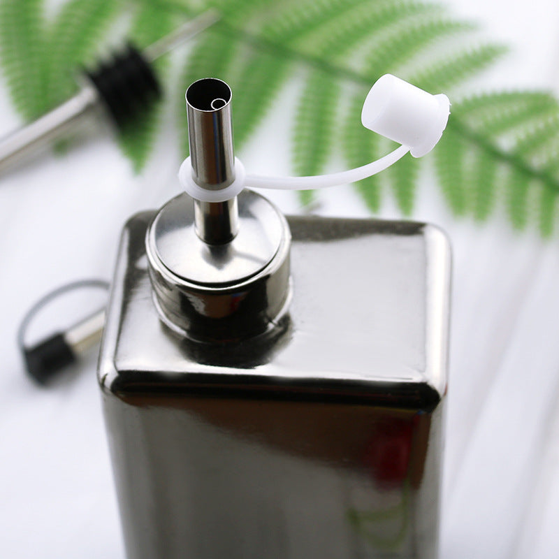Stainless steel pourer for oil and vinegar bottles
