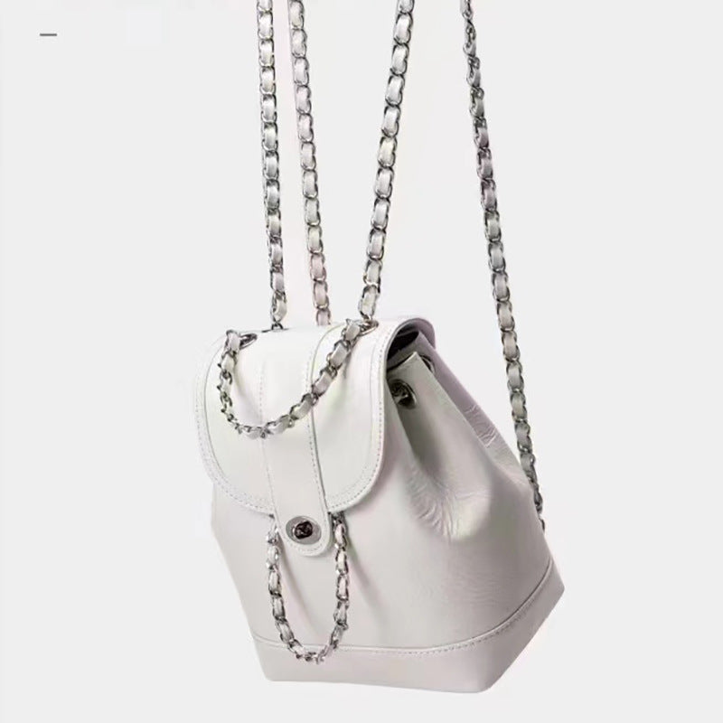 Compact backpack made of PU with chain decoration