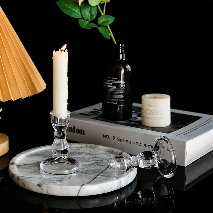 Glass candle holders in various shapes