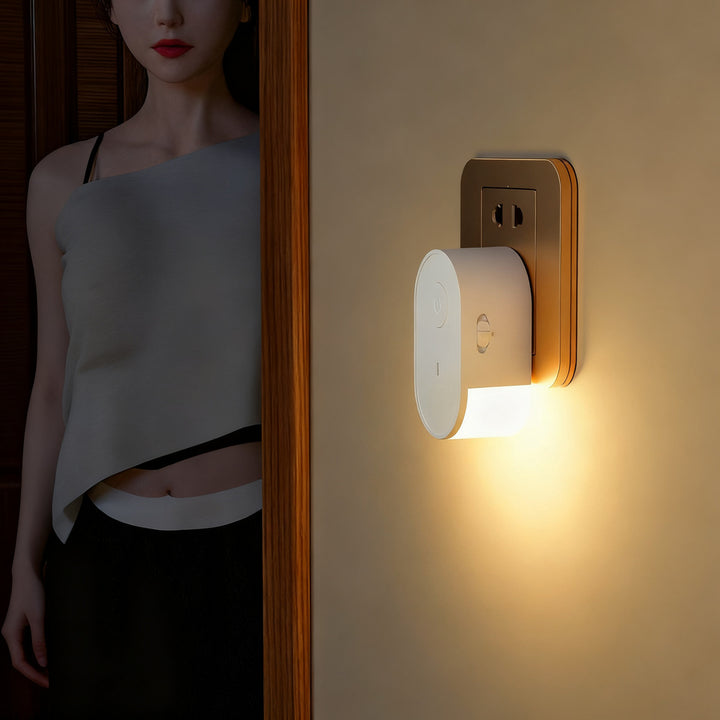 Motion sensor night light with twilight sensor