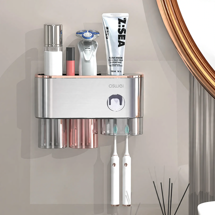 Toothbrush wall holder with toothpaste squeezer