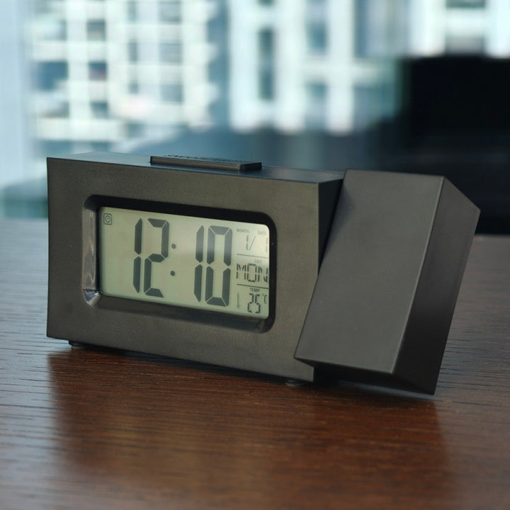 Mini projection clock with LCD display