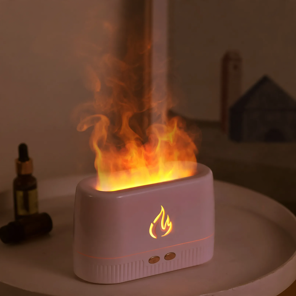 Aroma diffuser with flame effect and air humidifier