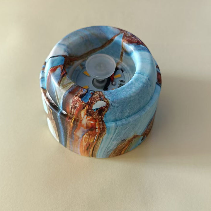 Glowing crystal ball with rotating base