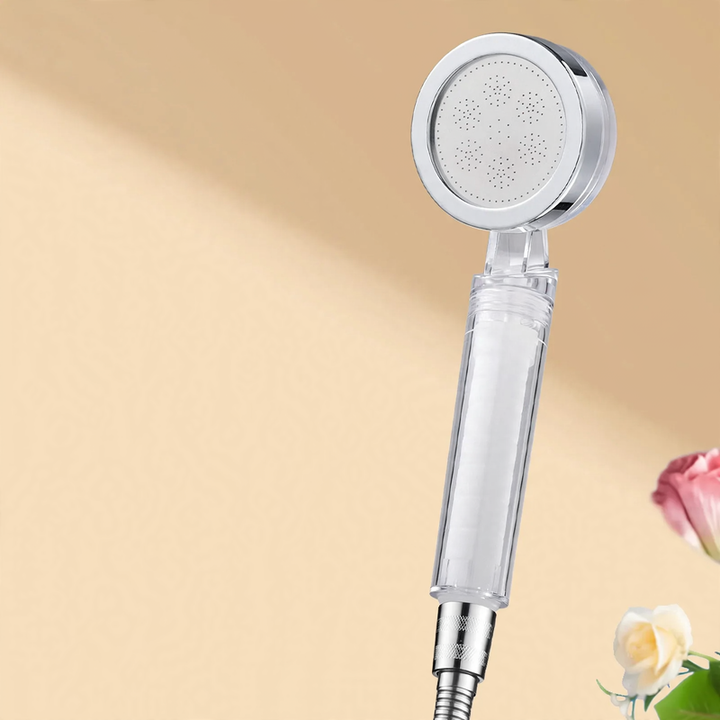 Portable shower head with pressure boost and filter