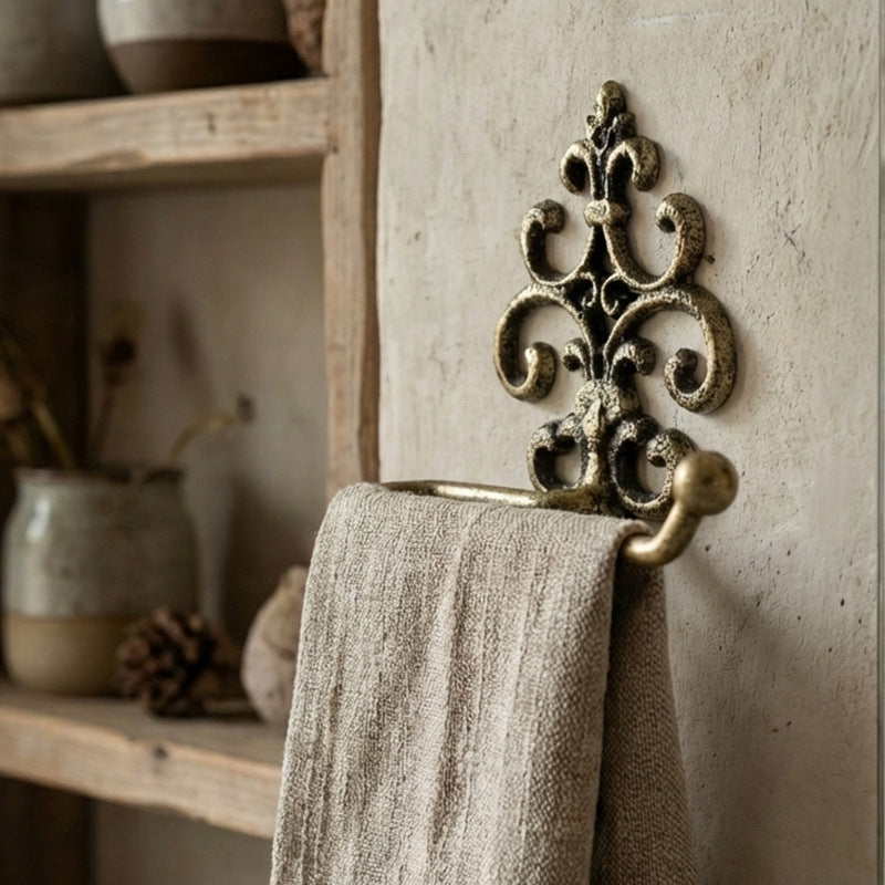 Cast iron wall bracket for towels and paper
