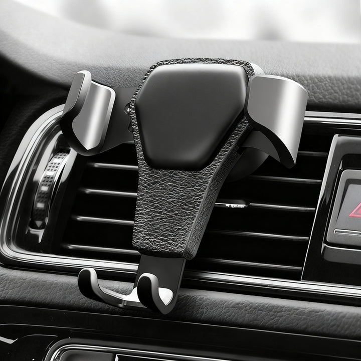 Car phone holder for the ventilation