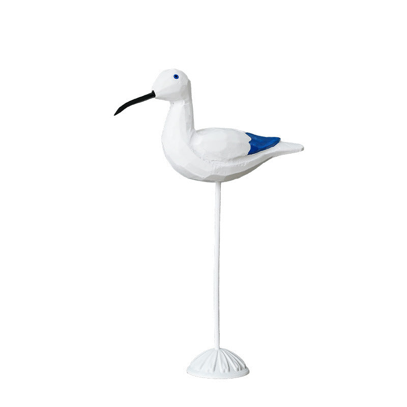 Wood bird figure in Mediterranean style