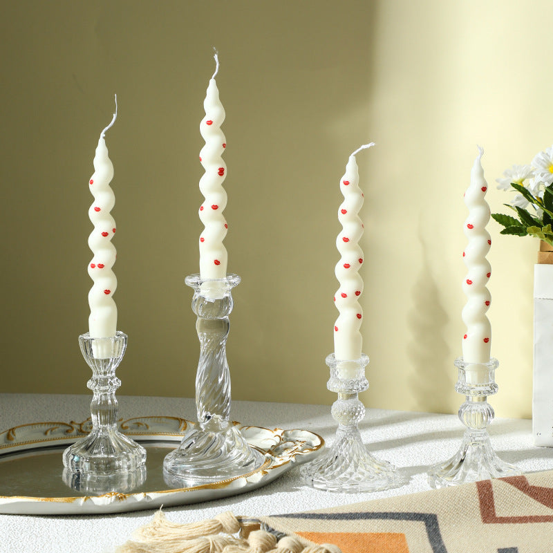 Transparent glass candle holder with structured pattern