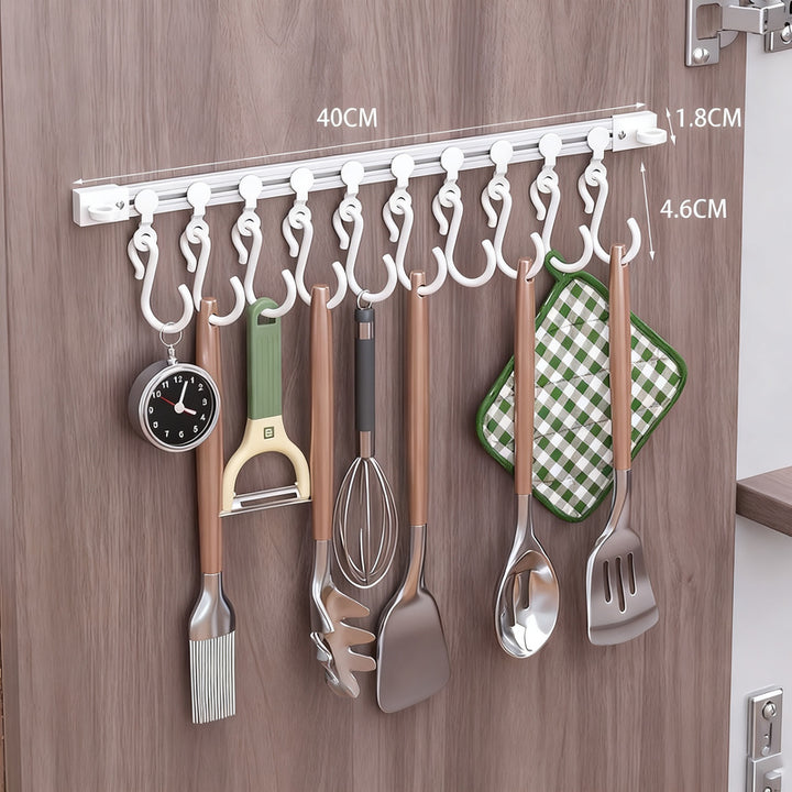Track system with hooks for cabinet doors