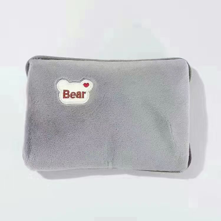 Electric hot water bottle with plush cover