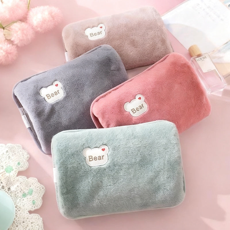 Electric hot water bottle with plush cover