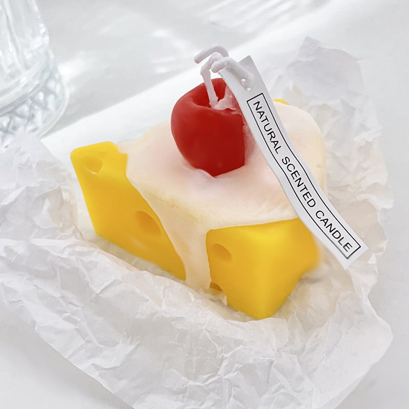 Handcrafted scented candle in cheese shape
