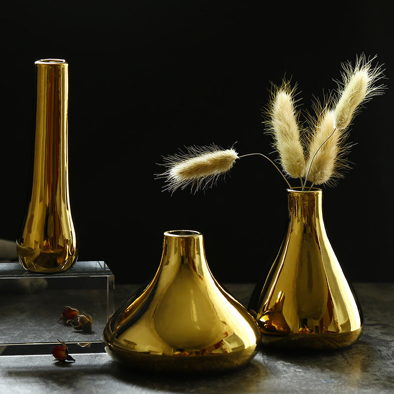 Ceramic flower vase with gold finish, geometric