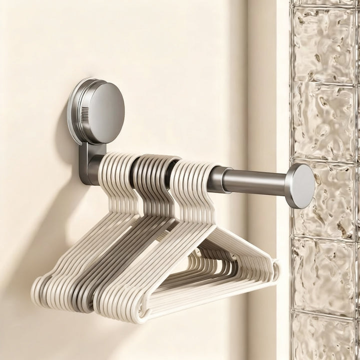 Telescopic clothes rail with suction cup