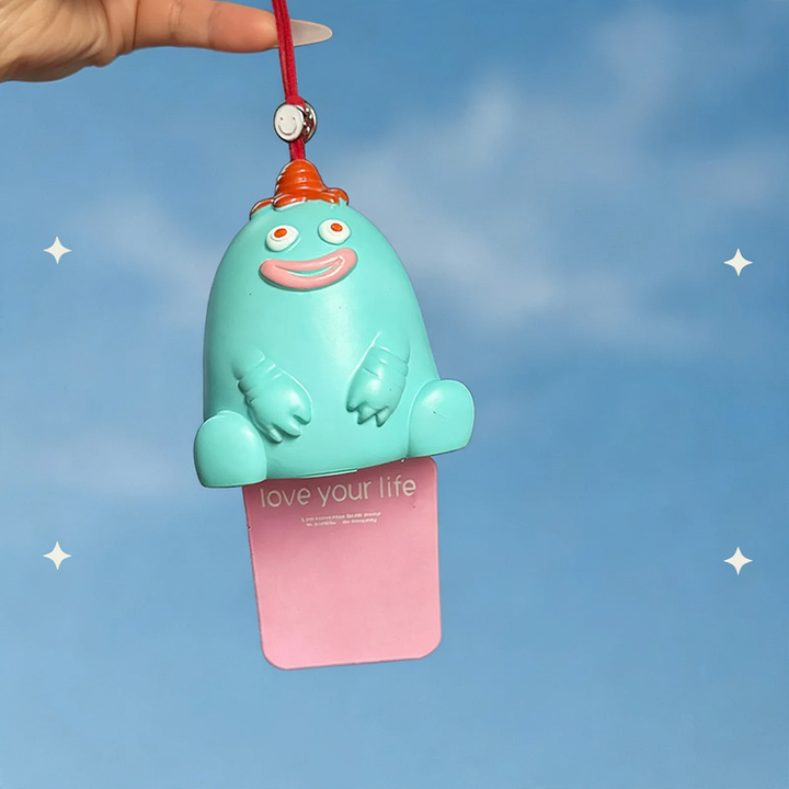Scent hanger for rearview mirror with monster motif
