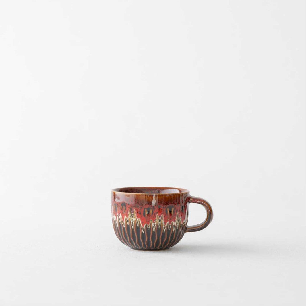 Ceramic coffee mug with oven glaze
