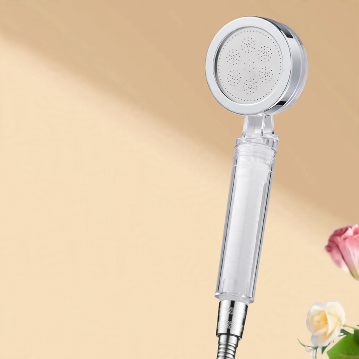 Portable shower head with pressure boost and filter