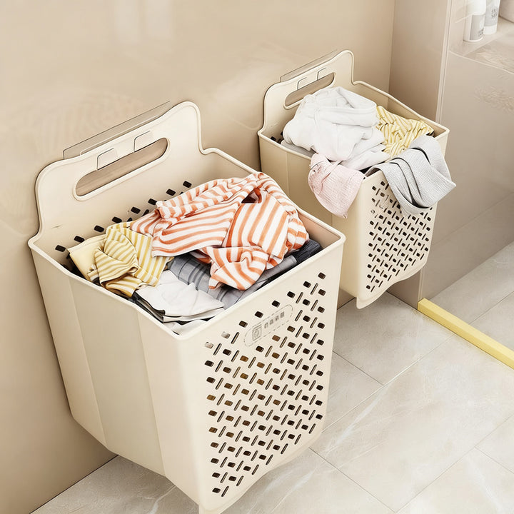 Foldable laundry basket for wall mounting