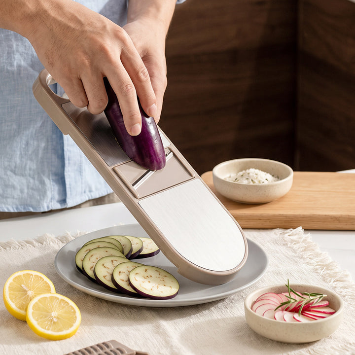 Multifunctional vegetable cutter with hand protection