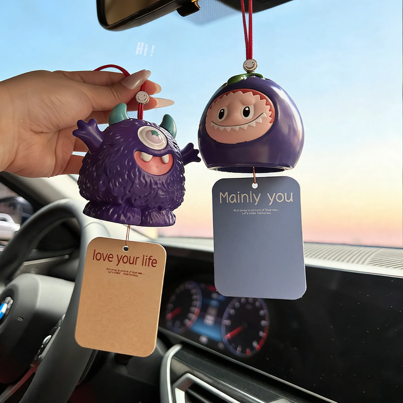 Scent hanger for rearview mirror with monster motif