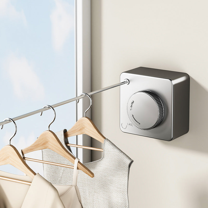 Expandable clothesline made of steel cable, invisible