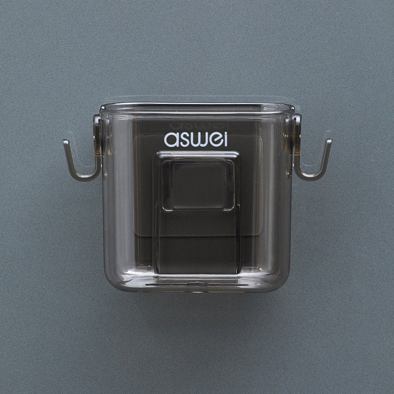 Wall-mounted storage box for remote controls and phones