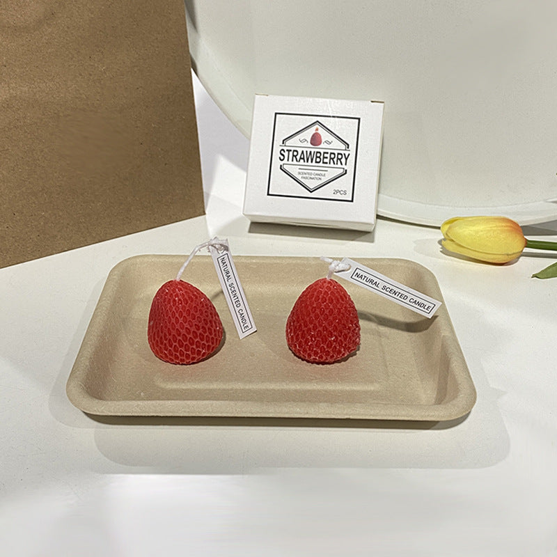 Handcrafted scented candle made of soy wax, fruit shape