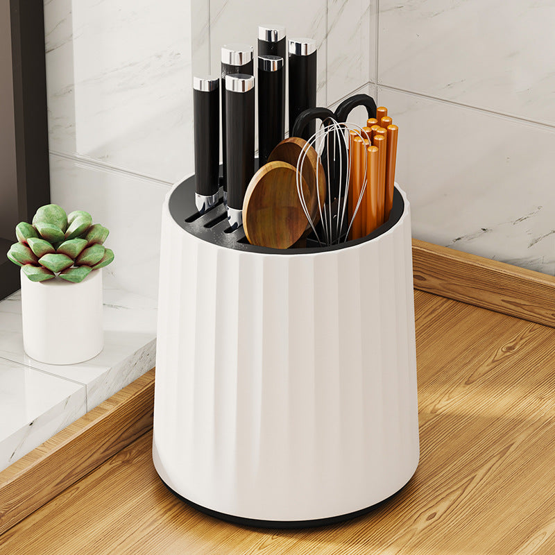 Rotating knife holder with cutlery compartment