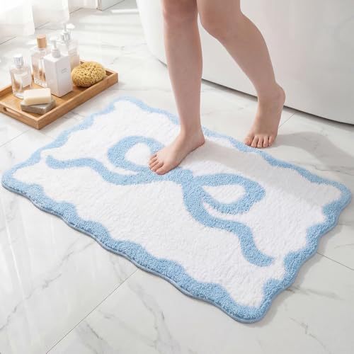 Bath mat with bow motif, synthetic fiber fabric