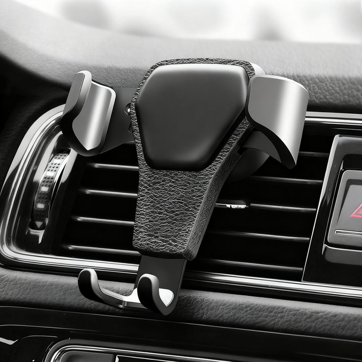 Car phone holder for the ventilation