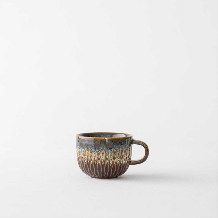 Ceramic coffee mug with oven glaze