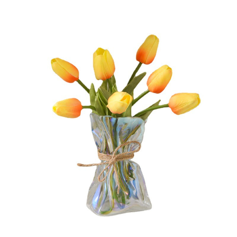 Glass vase with irregular folding pattern