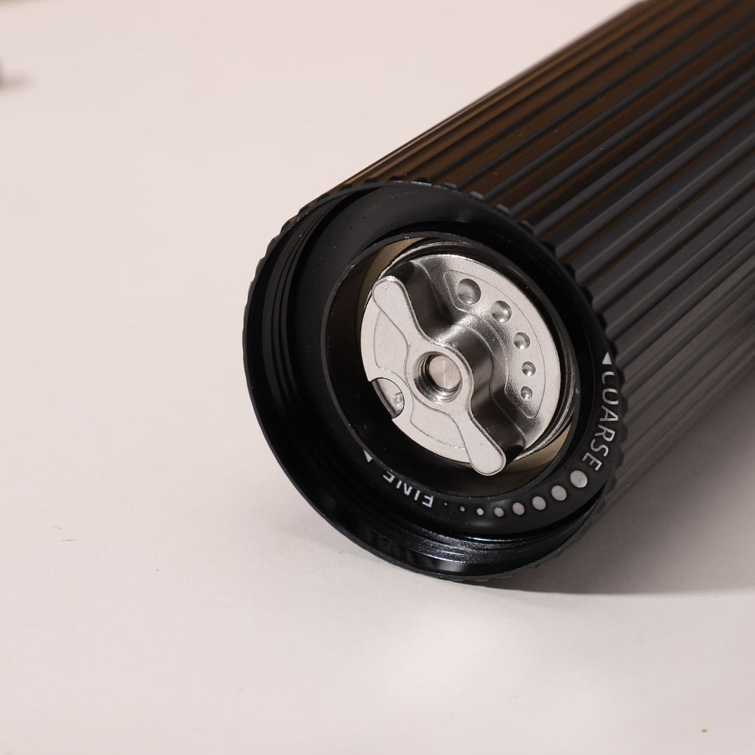 Hand coffee grinder with CNC grinding mechanism and brush