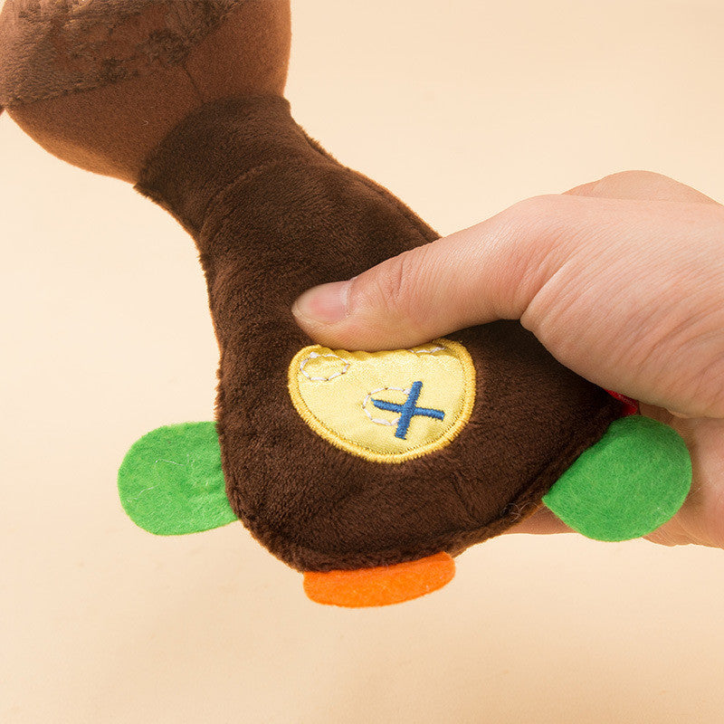 Plush toy with squeaker for dogs