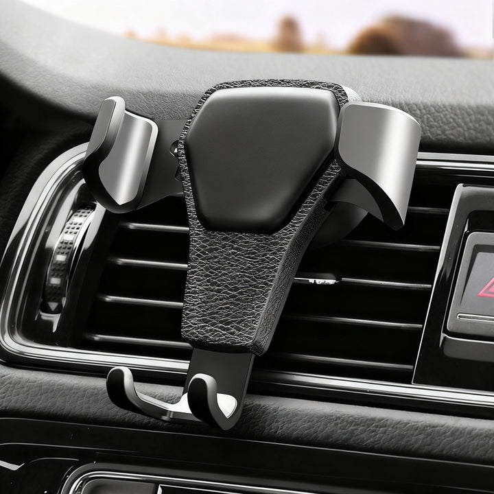 Car phone holder for the ventilation
