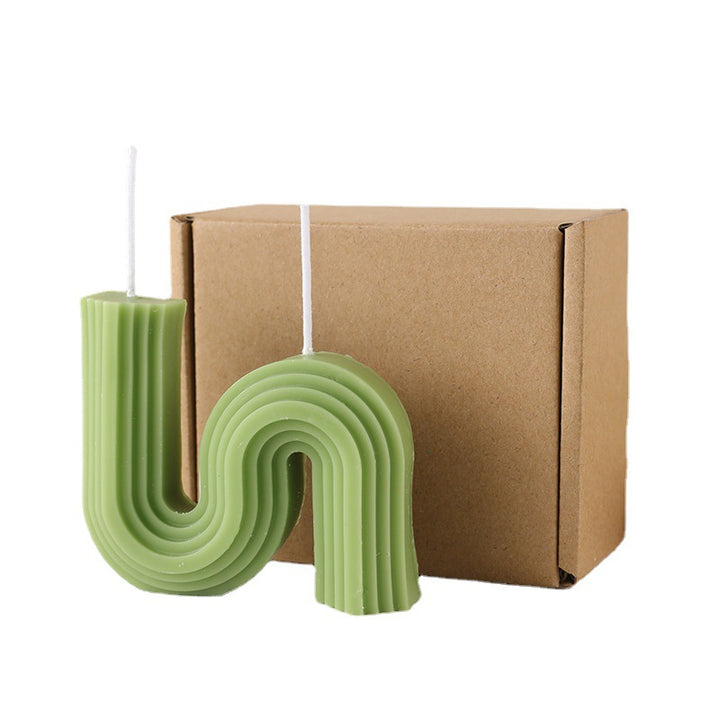 S-shaped scented candle made of soy wax