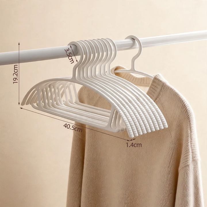 Plastic clothes hanger with anti-slip protection