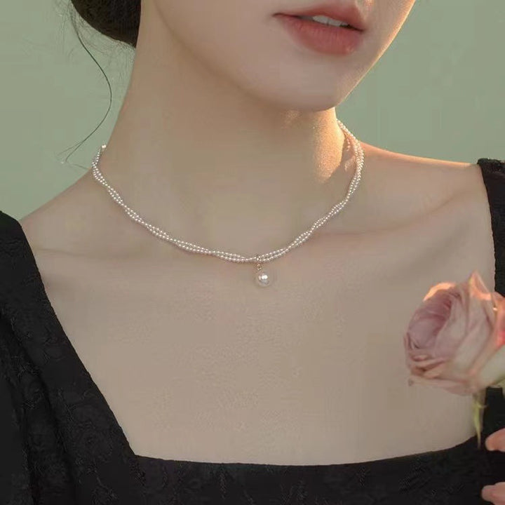 Pearl necklace with silver clasp, pearls 4–12 mm
