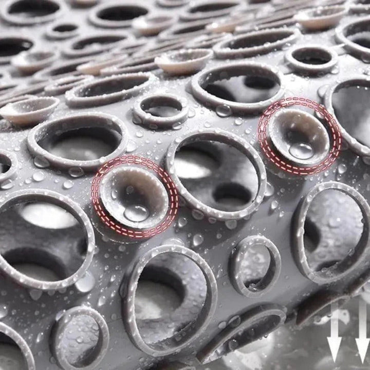 Shower mat with suction cups and drainage holes | Kalsten