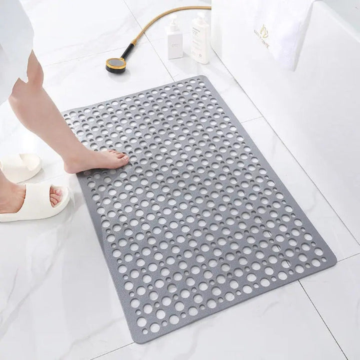 Shower mat with suction cups and drainage holes | Kalsten