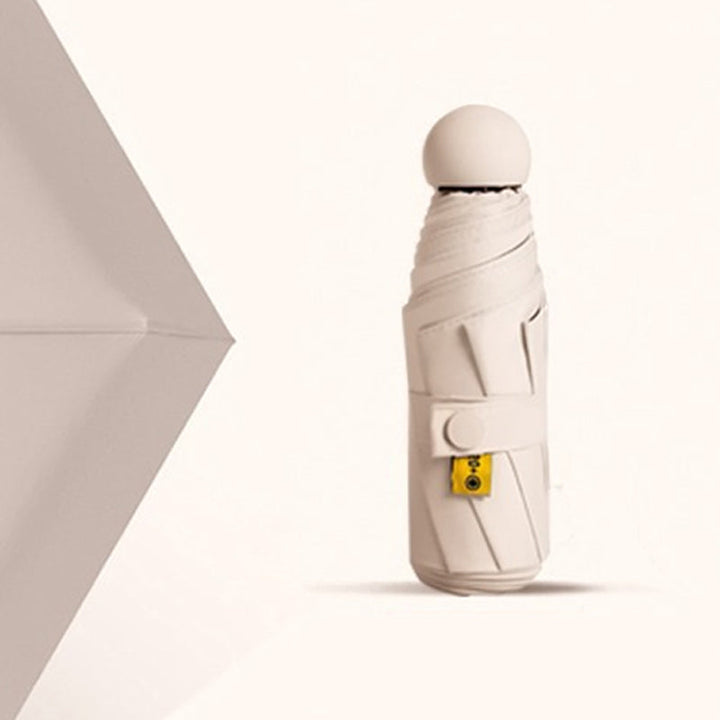 Capsule pocket umbrella with sun protection | Kalsten