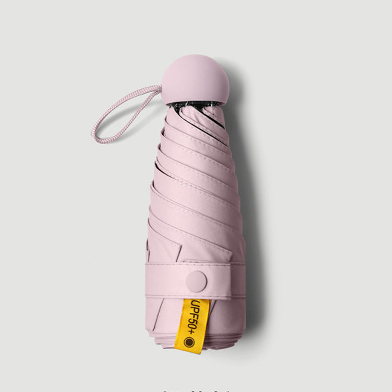 Capsule pocket umbrella with sun protection | Kalsten